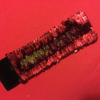 Mermaid bracelet with sequins that change from the touch, from red to gold and back again.